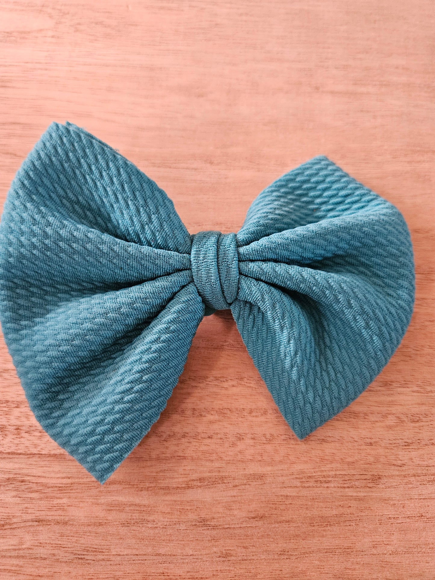 Dark teal bow